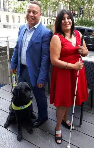 22 1 Fancy a REAL Blind Date? Man and woman with black lab guide dog